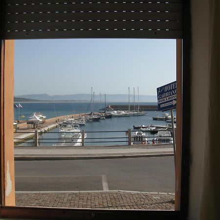 Borgo Spiaggia Vista Mare Isola Rossa Bagian luar foto