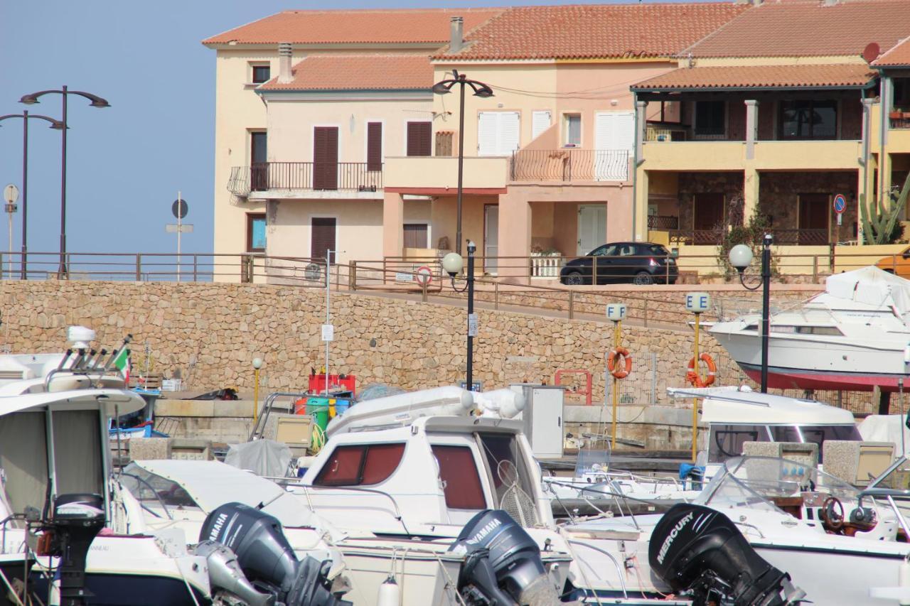 Borgo Spiaggia Vista Mare Isola Rossa Bagian luar foto