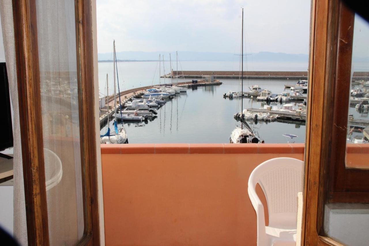 Borgo Spiaggia Vista Mare Isola Rossa Bagian luar foto