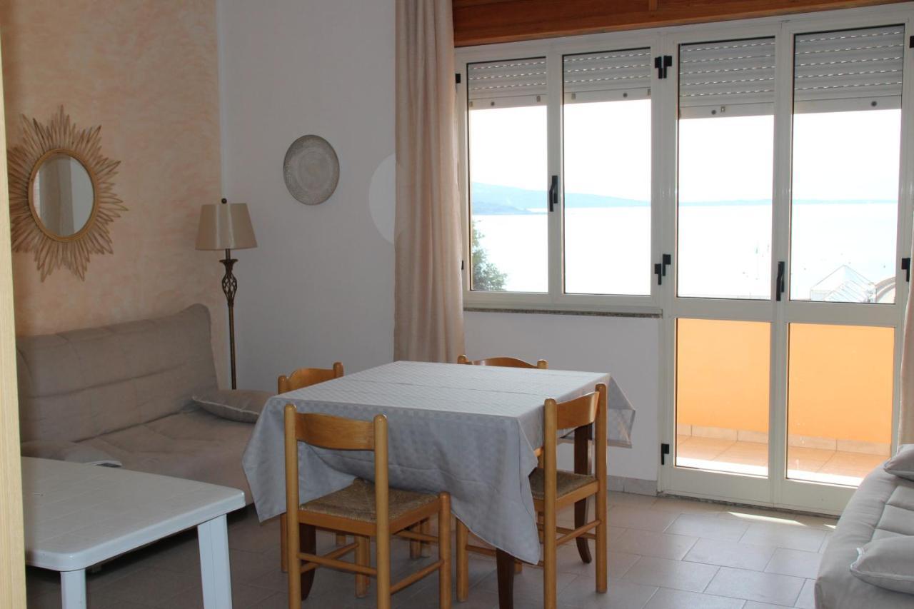 Borgo Spiaggia Vista Mare Isola Rossa Bagian luar foto