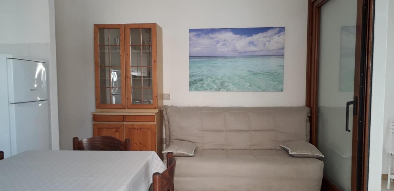 Borgo Spiaggia Vista Mare Isola Rossa Bagian luar foto