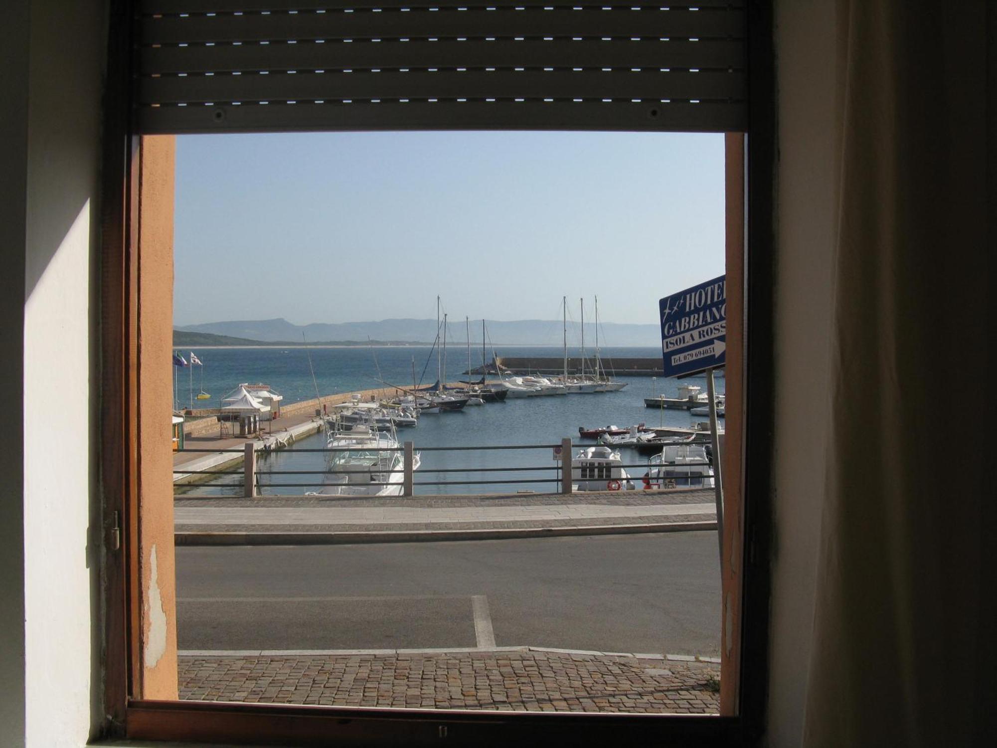Borgo Spiaggia Vista Mare Isola Rossa Bagian luar foto