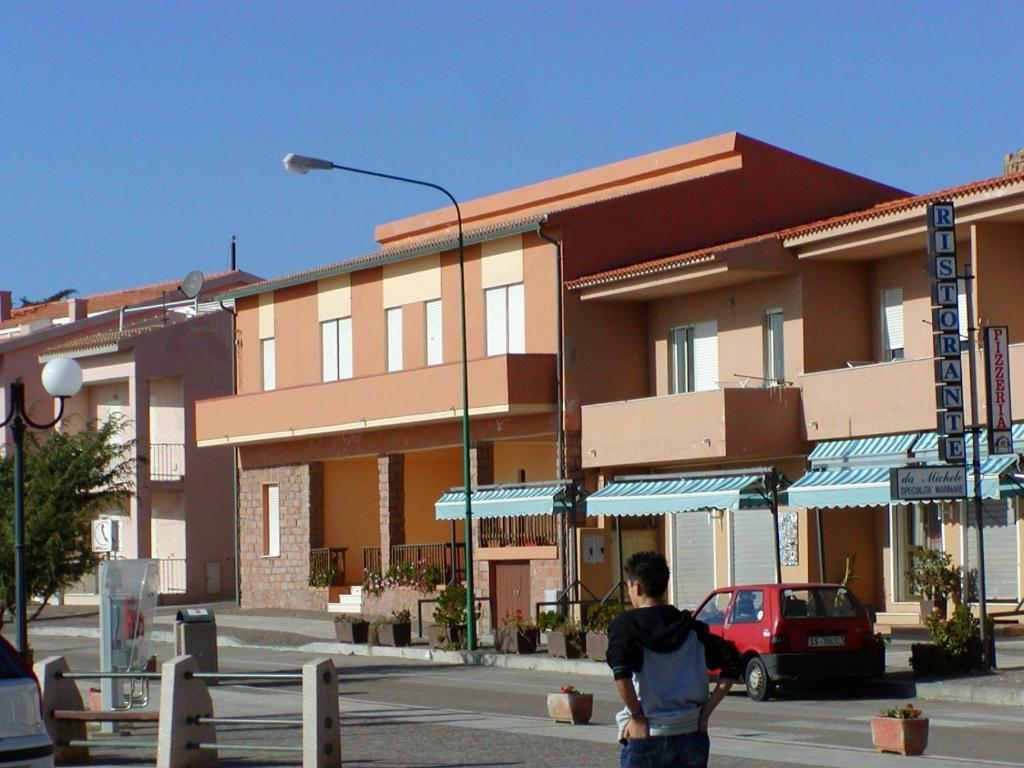 Borgo Spiaggia Vista Mare Isola Rossa Ruang foto