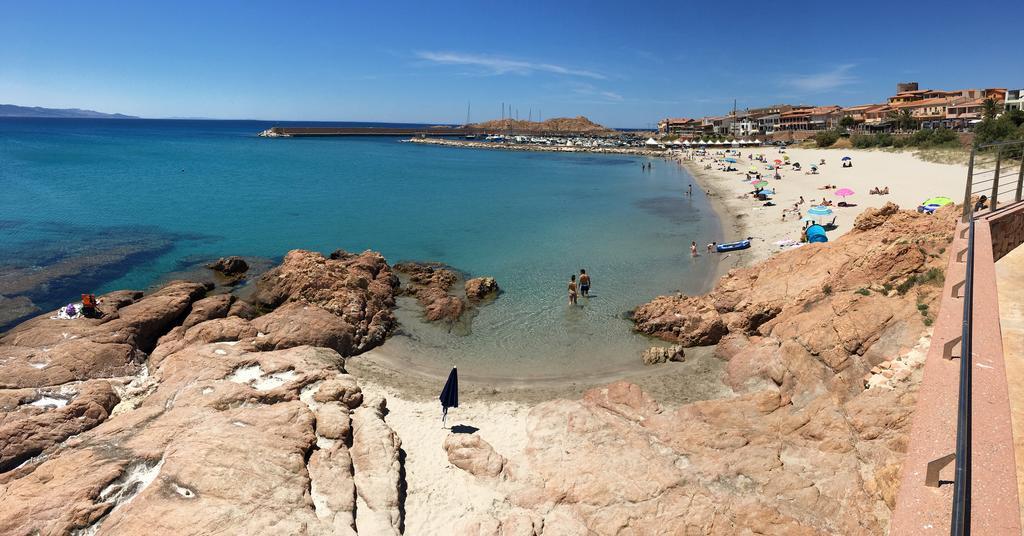 Borgo Spiaggia Vista Mare Isola Rossa Bagian luar foto