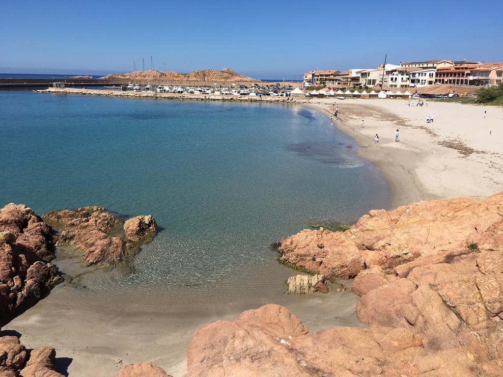 Borgo Spiaggia Vista Mare Isola Rossa Bagian luar foto