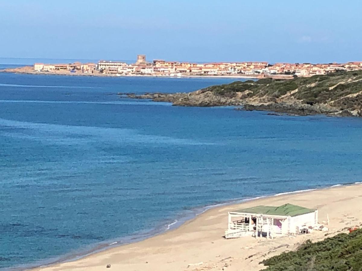 Borgo Spiaggia Vista Mare Isola Rossa Bagian luar foto